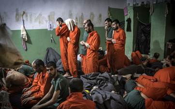 Who is responsible for the ISIS prison break in Syria?