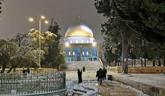Israeli forces arrest a Palestinian enjoying snow in Al-Aqsa