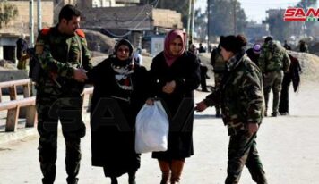 Syrian Army, Red Crescent receive displaced families in Hasaka